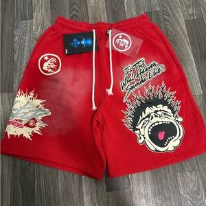 Vibrant Red Athletic Shorts with Graphic Designs